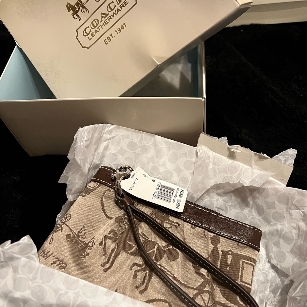 Coach small brown wristlet